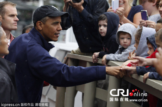 奥巴马现身快餐店引围观依旧爱吃油炸食品（图)